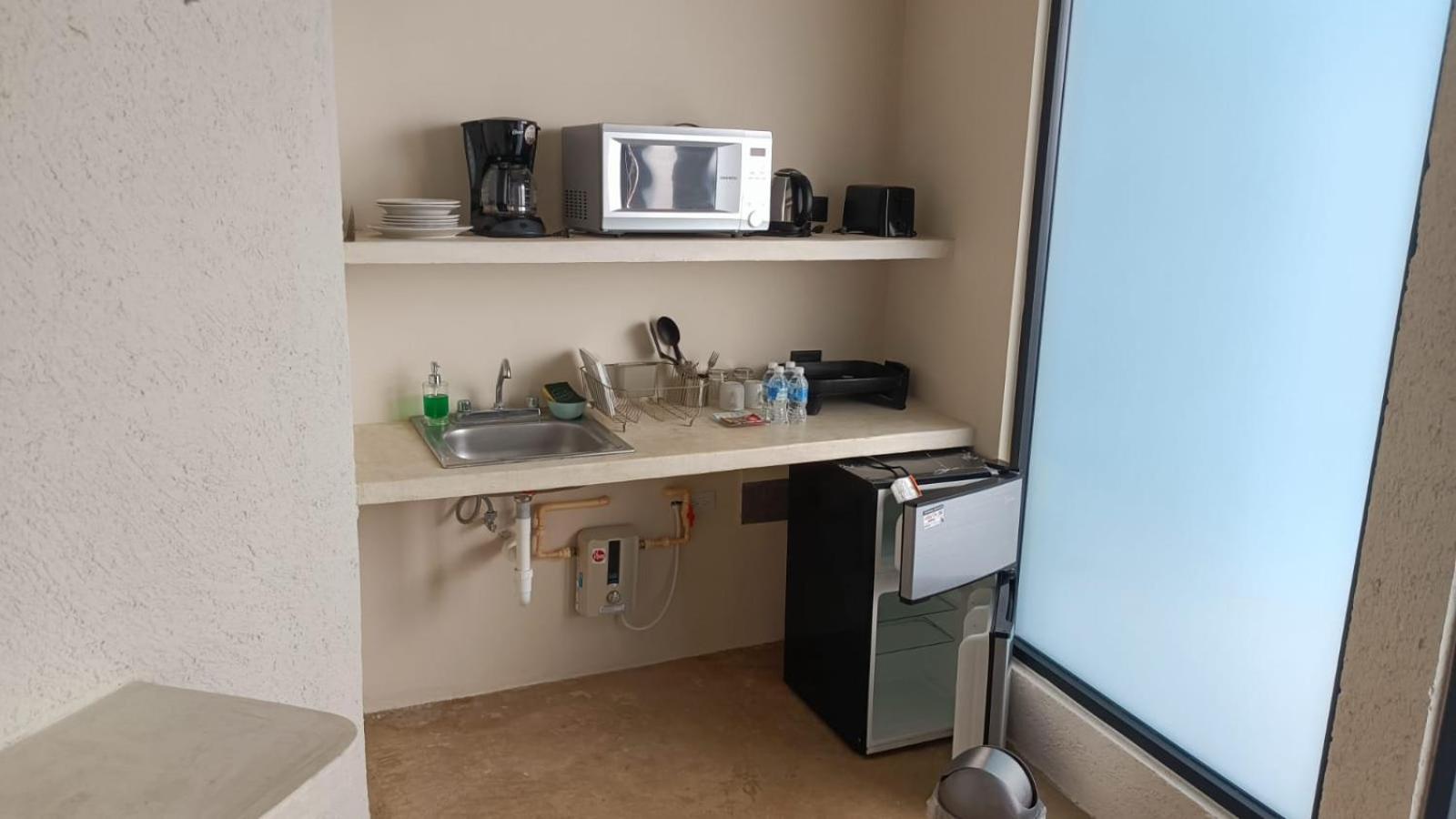 Xuva Lejlighedshotel Mérida Værelse billede